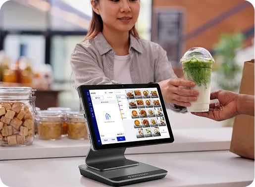 Series 5 tablet on its countertop dock in a cafe